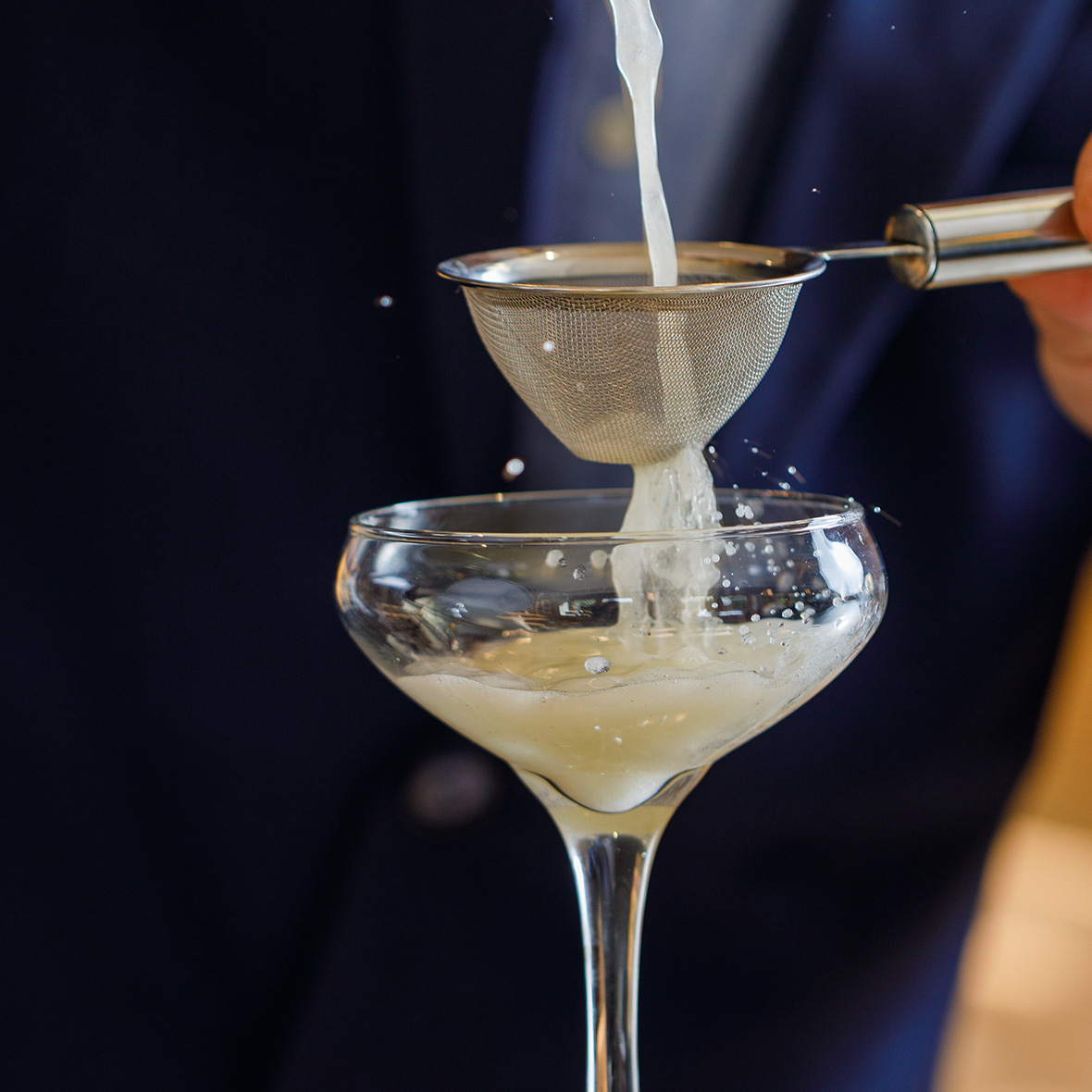 a cocktail being prepared